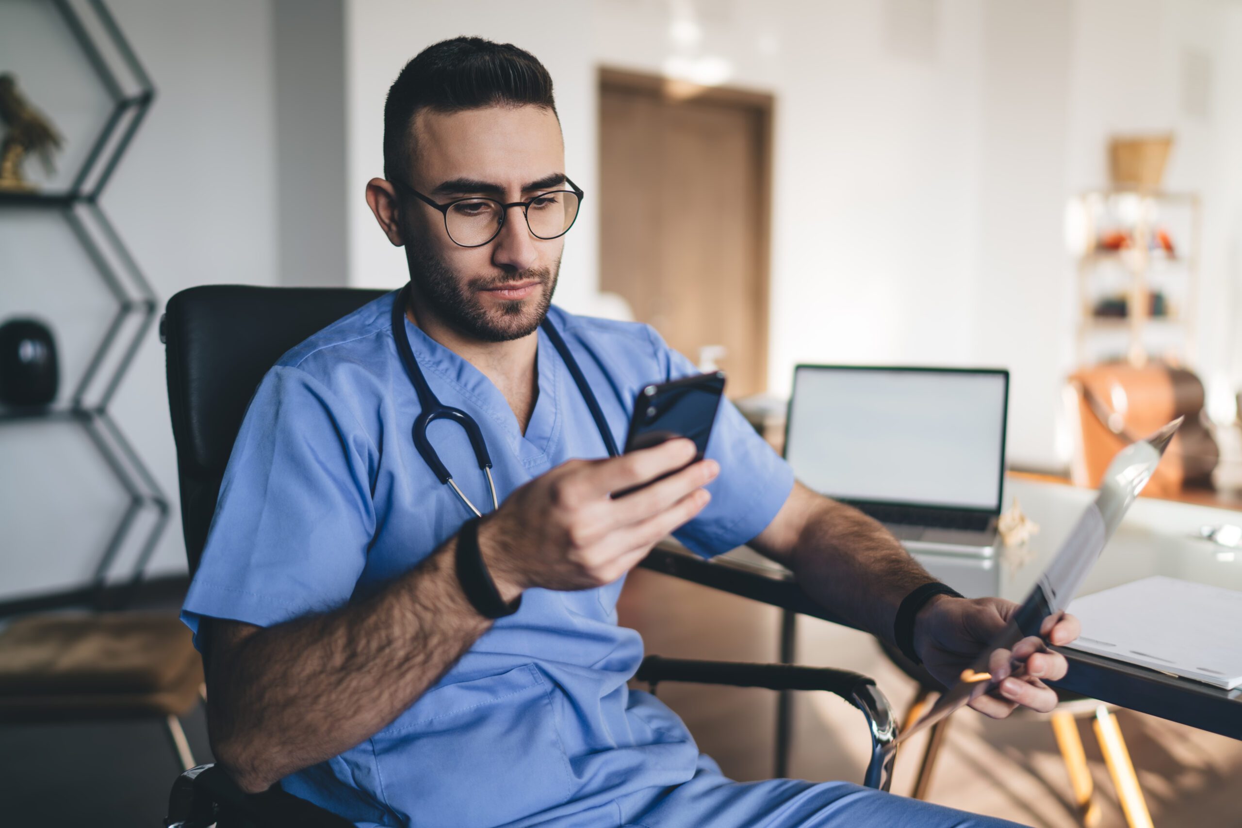 Dr looking at LinkedIn tips as an audiology student